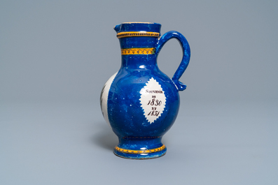 A polychrome Brussels faience commemorative 'musical design' jug, 19th C.