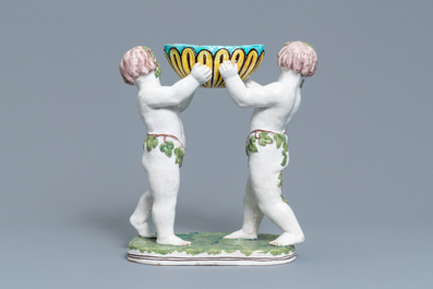 Een polychrome aardewerken groep met twee Bacchusfiguren in Brusselse stijl, Geo Martel, D&egrave;svres, begin 20e eeuw