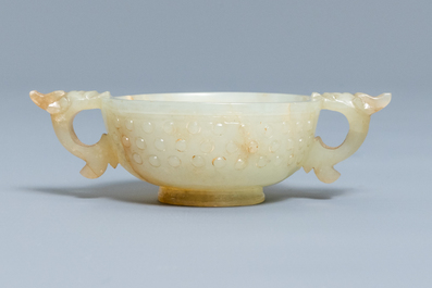 A Chinese pale celadon and russet jade two-handled bowl, prob. Ming