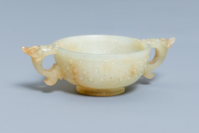 A Chinese pale celadon and russet jade two-handled bowl, prob. Ming