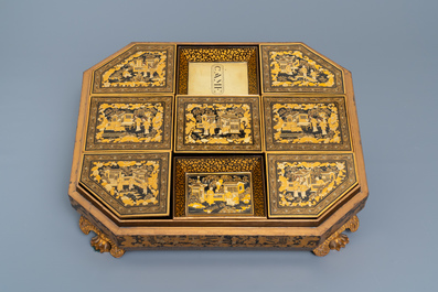 An extensive Chinese Canton export gilt and lacquer gaming box with mother-of-pearl accessories, 19th C.