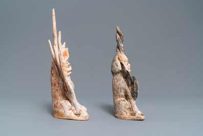 A pair of Chinese painted pottery models of 'earth spirits', Tang
