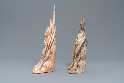 A pair of Chinese painted pottery models of 'earth spirits', Tang
