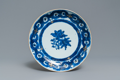 Three Chinese gilt-decorated blue and white plates, Qianlong