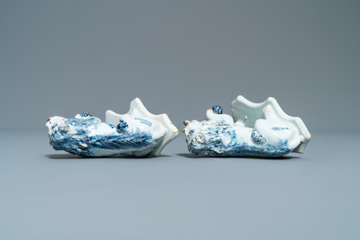 A pair of Dutch Delft blue and white models of lions, 18th C.