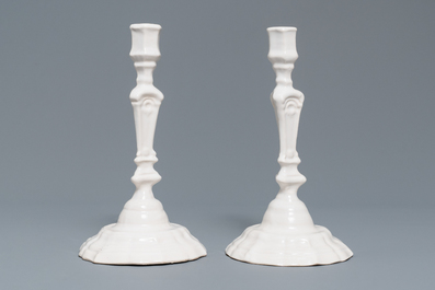 A pair of white Delftware candlesticks, 18th C.