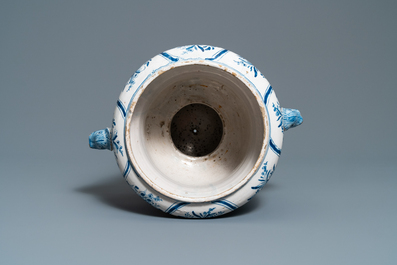 A large blue and white two-handled urn with floral design, Makkum, 18th C.