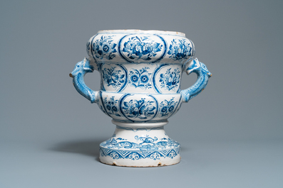 A large blue and white two-handled urn with floral design, Makkum, 18th C.