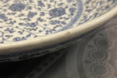 A Chinese Ming-style blue and white 'floral scroll' dish, Qianlong