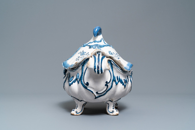 A blue and white Brussels faience rocaille tureen and cover, 18th C.