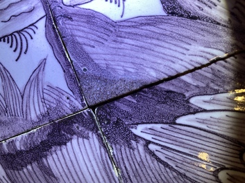 A pair of fine Dutch Delft manganese tile murals with a hen and a rooster, 18th C.