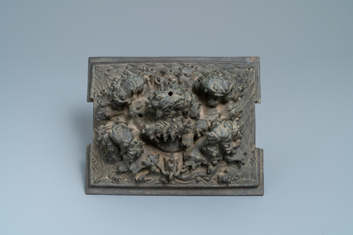 A large Chinese bronze censer and cover with animals near a hilly landscape, Ming