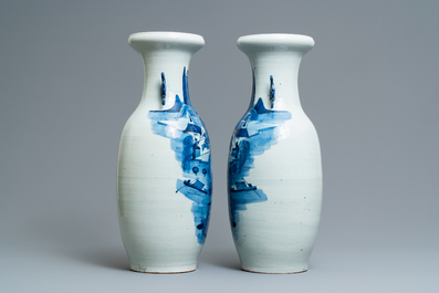 A pair of Chinese blue and white 'landscape' vases, 19th C.