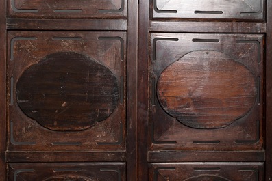 A Chinese wooden room divider with famille rose 'Romance of the Western Chamber' plaques, Republic