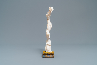 A Chinese carved white coral figure of a lady with fan, Republic