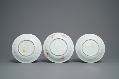 Three Chinese iron red and gilt plates and two bowls, Kangxi/Yongzheng