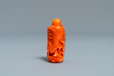 A Chinese carved red coral snuff bottle with a dragon, Republic