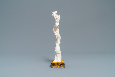 A Chinese carved white coral figure of a lady with fan, Republic