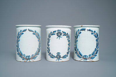 A set of six blue, white and manganese albarello-type drug jars, Nevers, France, 18th C.