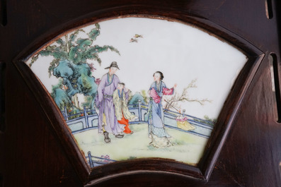 A Chinese wooden room divider with famille rose 'Romance of the Western Chamber' plaques, Republic