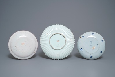 A collection of nine polychrome and blue and white Dutch Delft dishes, 18th C.