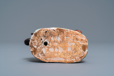 A polychrome Tournai faience model of a pug, 18th C.