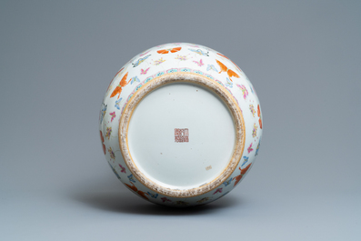 A Chinese famille rose 'hu' vase with butterflies, Qianlong merk, 20th C.