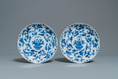 A pair of Chinese blue and white 'flower basket' dishes, Kangxi