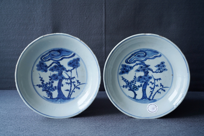 A pair of Chinese blue and white 'Three friends of winter' plates, Chenghua mark, Wanli