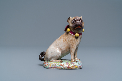 A polychrome Tournai faience model of a pug, 18th C.