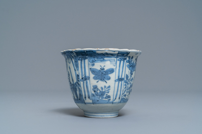 Two small Chinese blue and white plates and a crow cup, Kangxi and Wanli