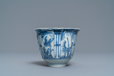 Two small Chinese blue and white plates and a crow cup, Kangxi and Wanli