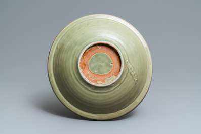 A Chinese Longquan celadon dish with incised floral design, Ming