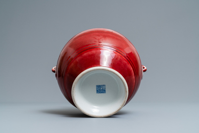 A Chinese monochrome sang-de-boeuf 'hu' vase, Qianlong mark, 19/20th C.