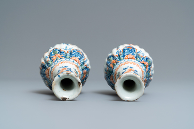 A pair of ribbed Dutch Delft cashmere palette bottle vases, 1st quarter 18th C.