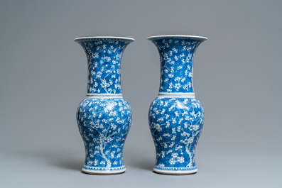 A pair of Chinese blue and white 'prunus on cracked ice' yenyen vases, Kangxi