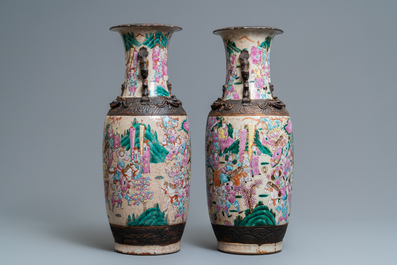 A pair of Chinese Nanking famille rose crackle-glazed 'warrior' vases, 19th C.