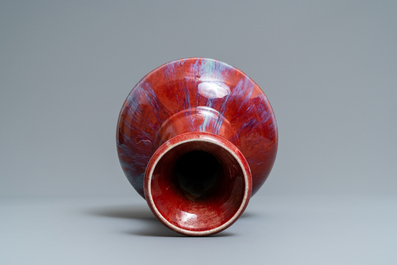 A Chinese monochrome flamb&eacute; sang-de-boeuf bottle vase, 19th C.