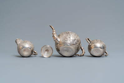 A Chinese silver teapot, cream jug and sugar jar, marked Luen Wo - Shanghai, late 19th C.
