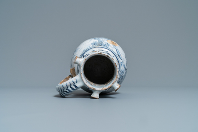 A blue and white Lille faience puzzle jug, 18th C.