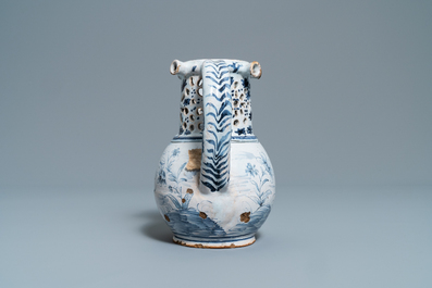 A blue and white Lille faience puzzle jug, 18th C.