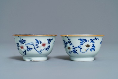 Six Chinese blue, white and copper-red cups and saucers, Kangxi