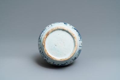 A Chinese blue and white kraak porcelain charger, a vase, a crow cup and a small plate, Wanli