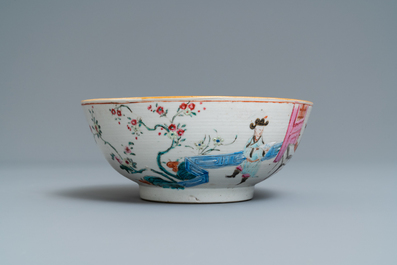 A Chinese famille rose bowl with figures in an interior, Yongzheng