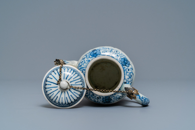 A large Japanese blue and white moulded Arita teapot with gilt silver mounts, Edo, 17th C.