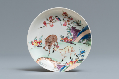 A Chinese famille rose 'deer' cup and saucer, Yongzheng