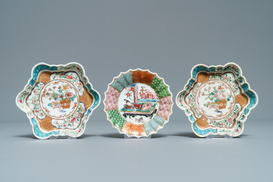 Three Chinese famille rose teapot stands, two spoon trays and a saucer, Yongzheng/Qianlong