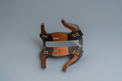 A Japanese aogai-nashiji 'kura' saddle with associated 'abumi' stirrups, Muromachi, 16th C.
