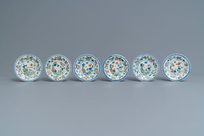 Eleven Chinese famille verte cups and saucers, Kangxi