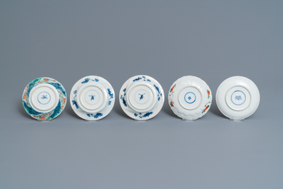 Eleven Chinese famille verte cups and saucers, Kangxi